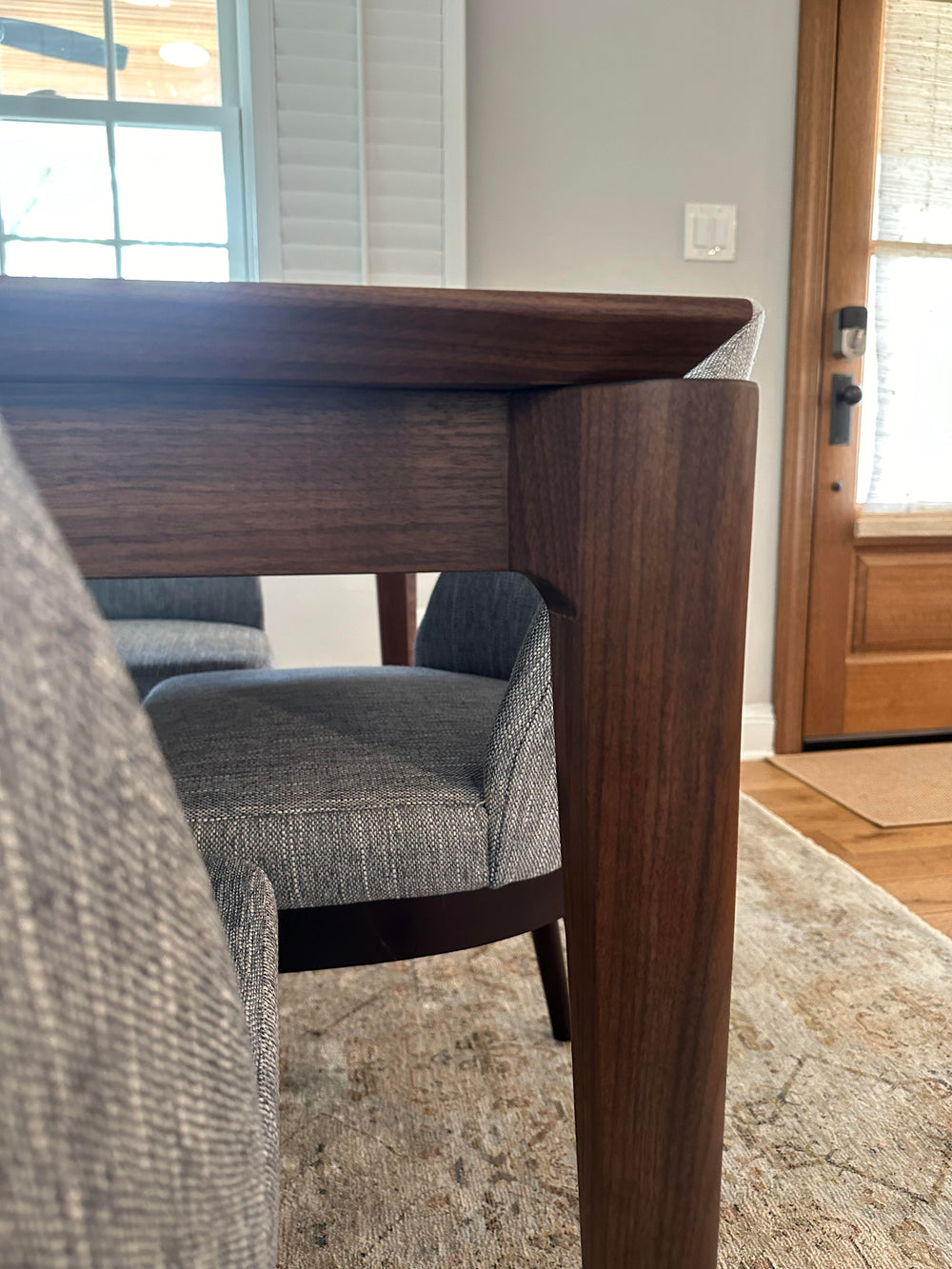 SARI in Walnut by Relic Table Co. handmade walnut dining table with 6 chairs modern dining room by interior designer