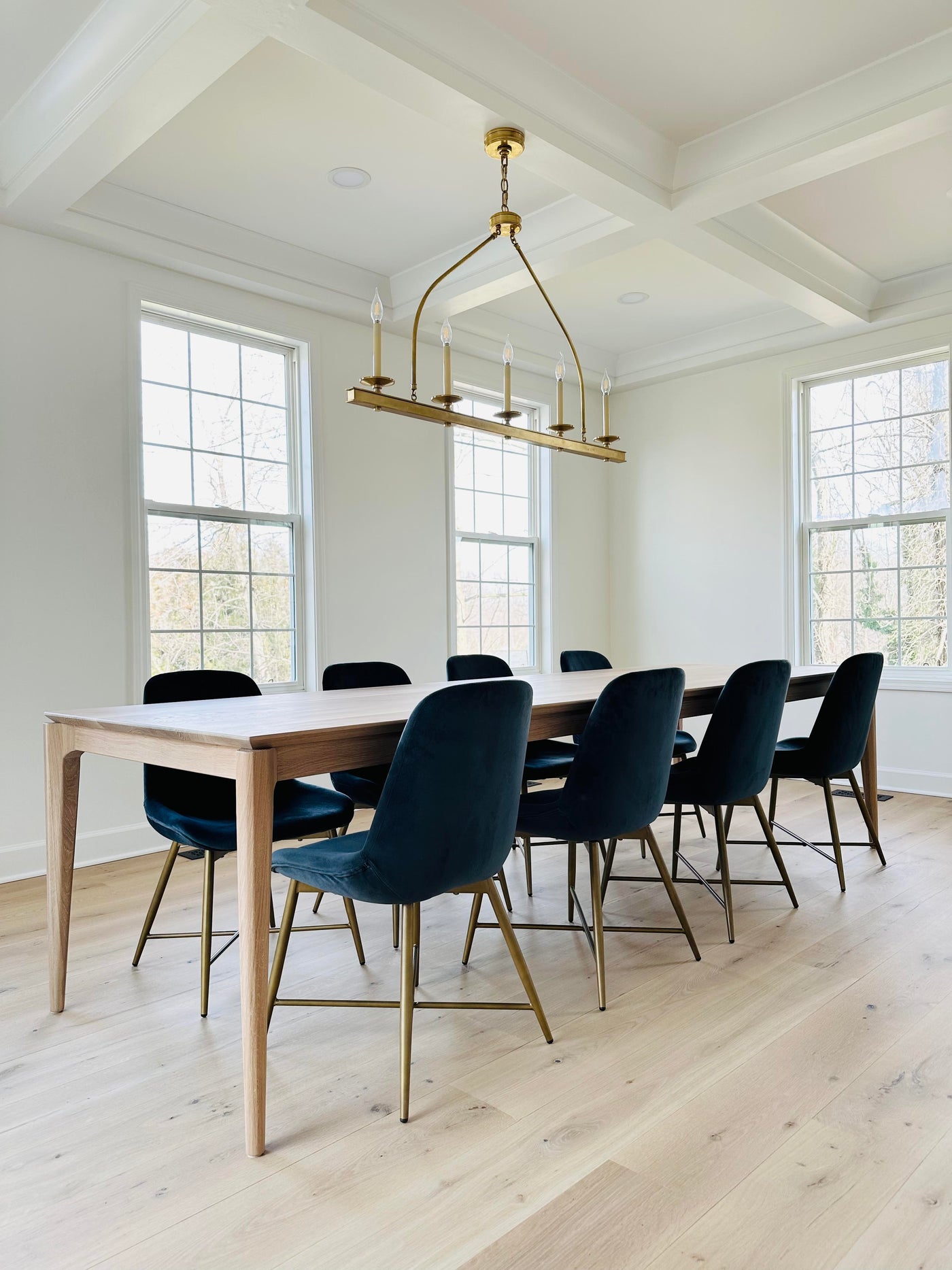 SARI in White oak by Relic Table Co. handmade walnut dining table with 8 chairs modern dining room by interior designer